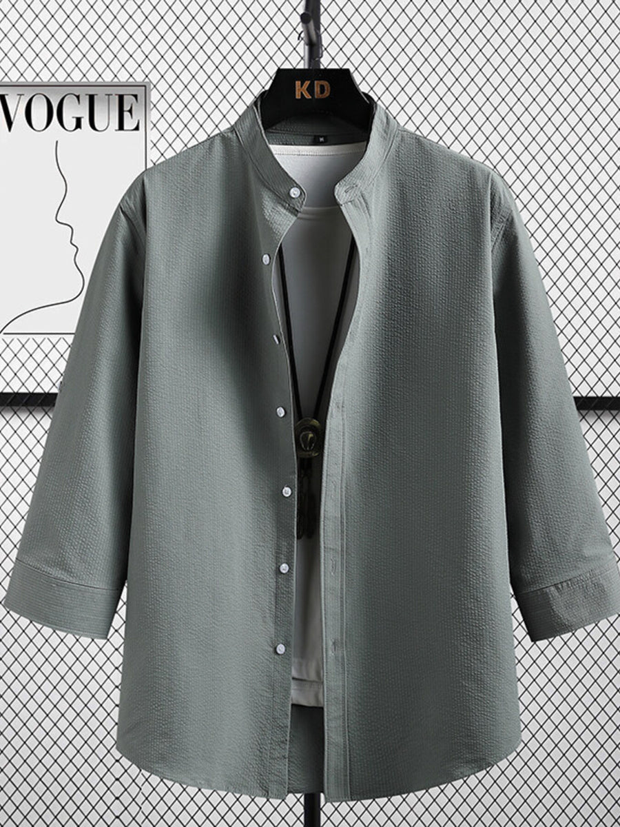 Men's grey textured band collar shirt with white buttons and 3/4 sleeves