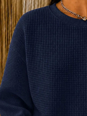 100% polyester Care instructions: Machine wash cold sweatshirt in Apricot with relaxed silhouette