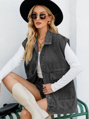 Denim utility vest in dark wash with collared neck and oversized front pockets.