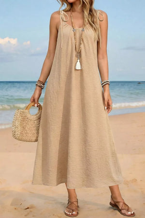 Beige tie-shoulder midi dress in cotton blend with textured fabric and a breezy, casual fit.
