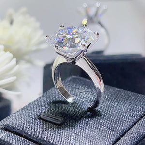 Solitaire engagement ring in 925 silver with a large radiant cut diamond.