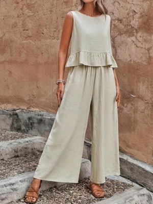 Beige ruffled peplum sleeveless top and wide-leg pants set