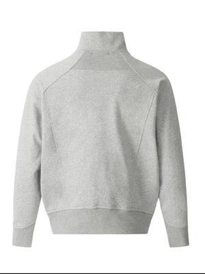 Gray zip-up sweatshirt with sculpted seam details and mock neck.
