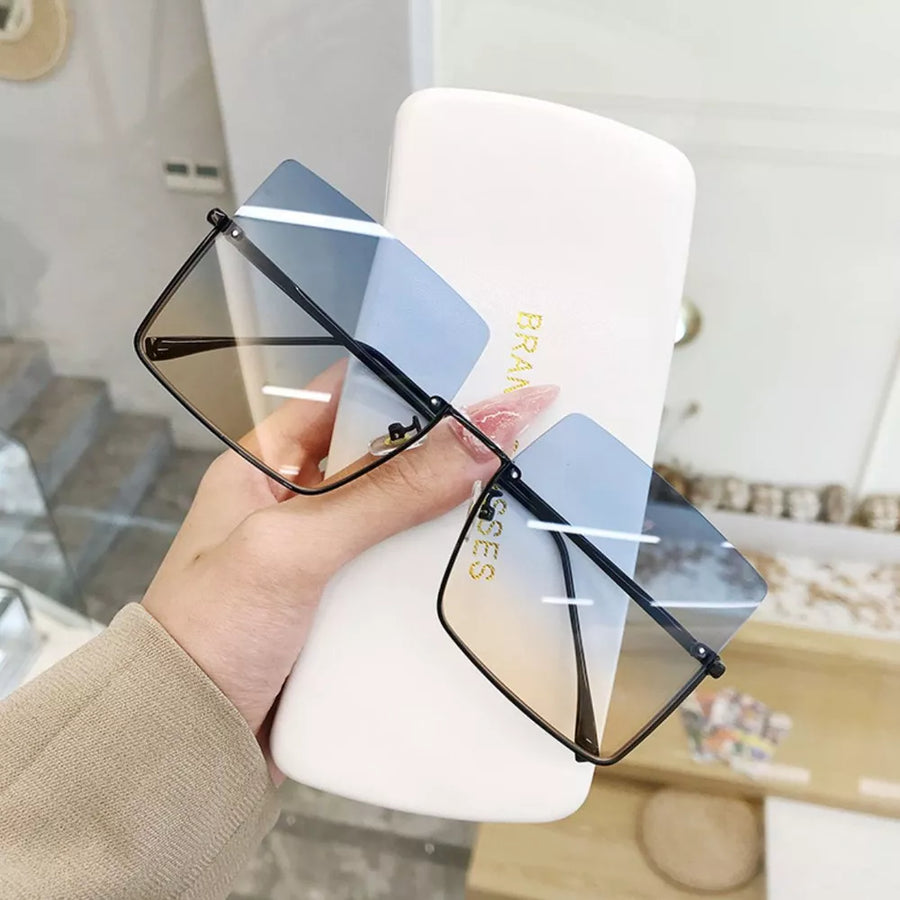 Pastel Blue sunglasses with N/A and N/A