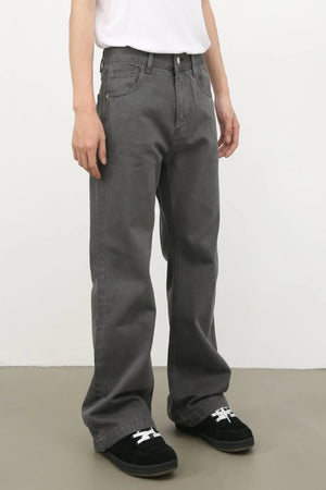 Wide-leg dark gray washed denim trousers with a relaxed fit.