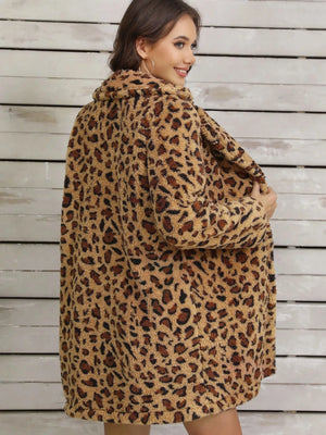 Cozy fuzzy teddy wrap coat in leopard print with a shawl collar.