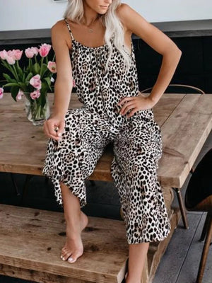 Leopard print spaghetti strap wide leg jumpsuit with side slits