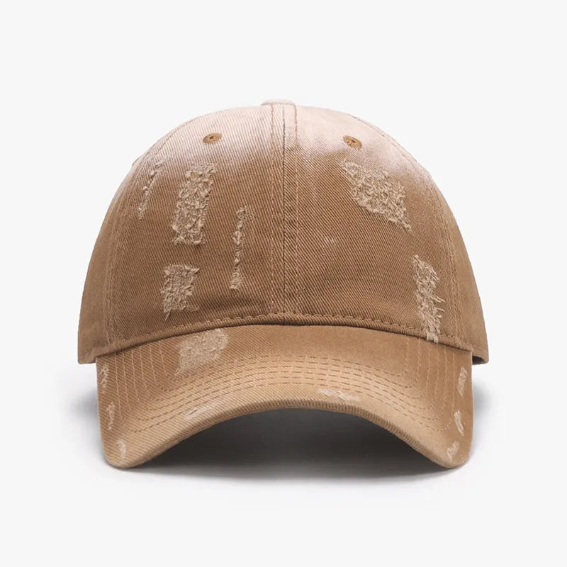 Distressed caramel cotton baseball cap with ripped details.