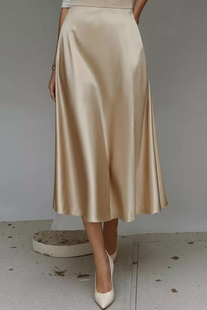 Lustrous midi skirt in khaki with a-line cut and hidden pockets.