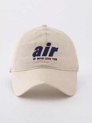 Khaki baseball cap with embroidered "air" and "of with love you" text
