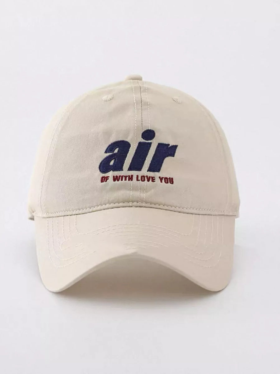 Khaki baseball cap with embroidered "air" and "of with love you" text