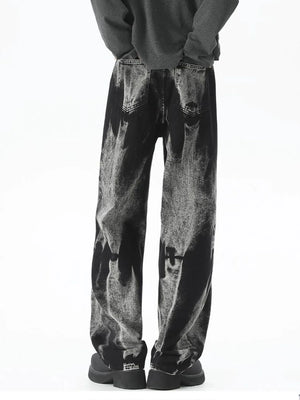 Men's black relaxed fit jeans with acid wash detail and a comfortable fit.