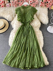 Elegant green lace maxi dress with ruffles and cutout waist