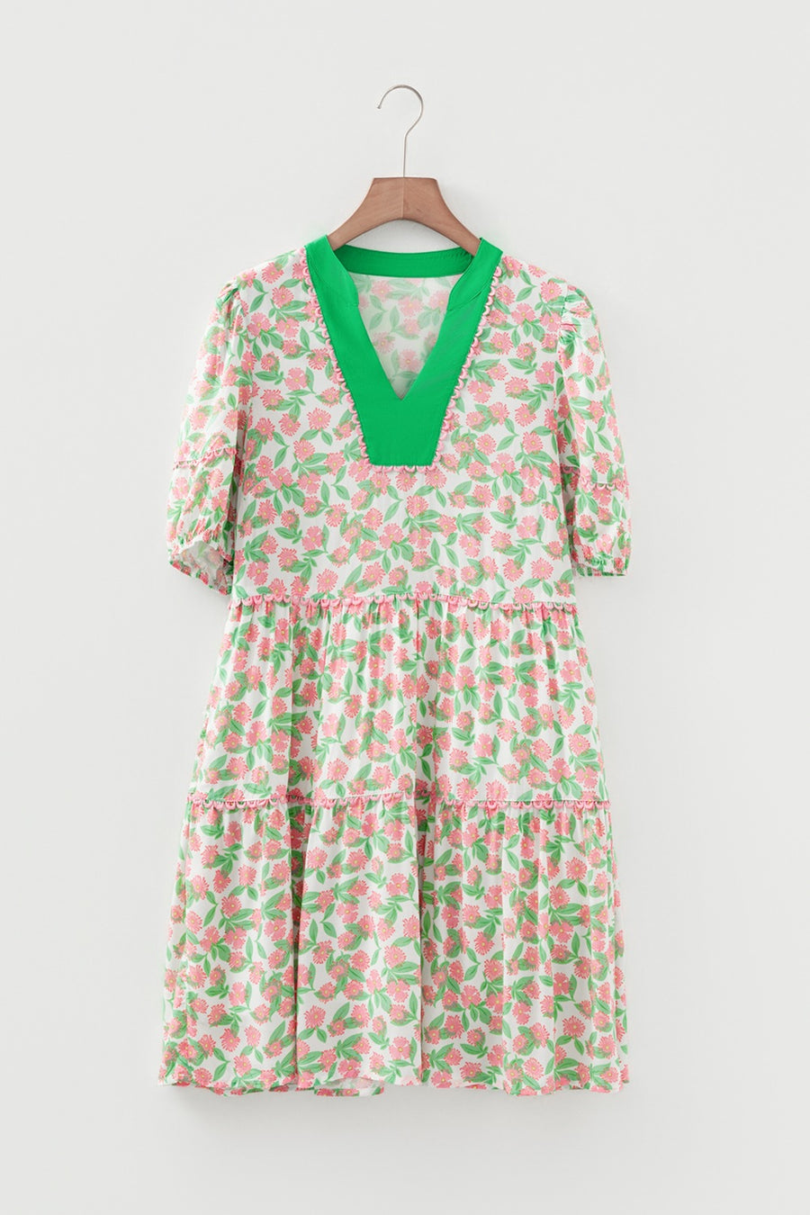 Tiered mini dress with green V-neck and pink floral print
