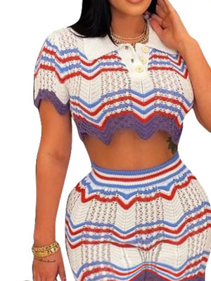 Crochet crop top and skirt set with zigzag stripes in white, red, blue, and purple.