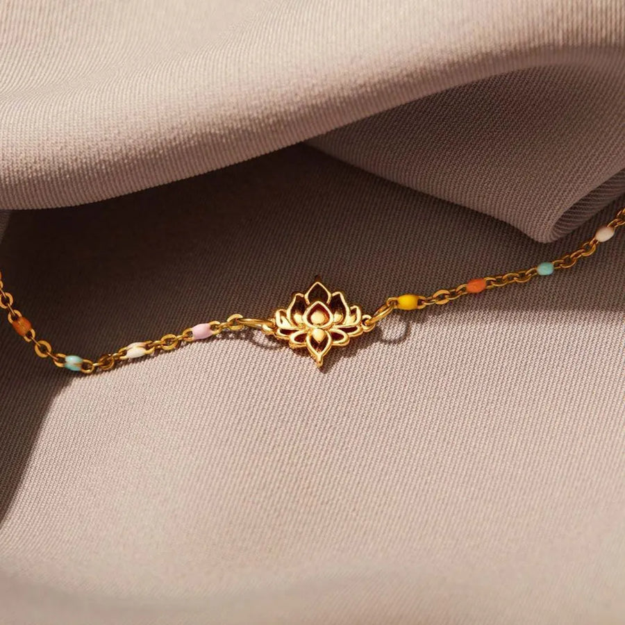 Gold lotus charm bracelet with colorful enamel beads