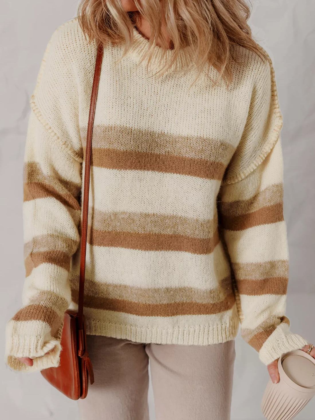 Striped drop shoulder sweater in cream and brown acrylic blend with a baggy fit.