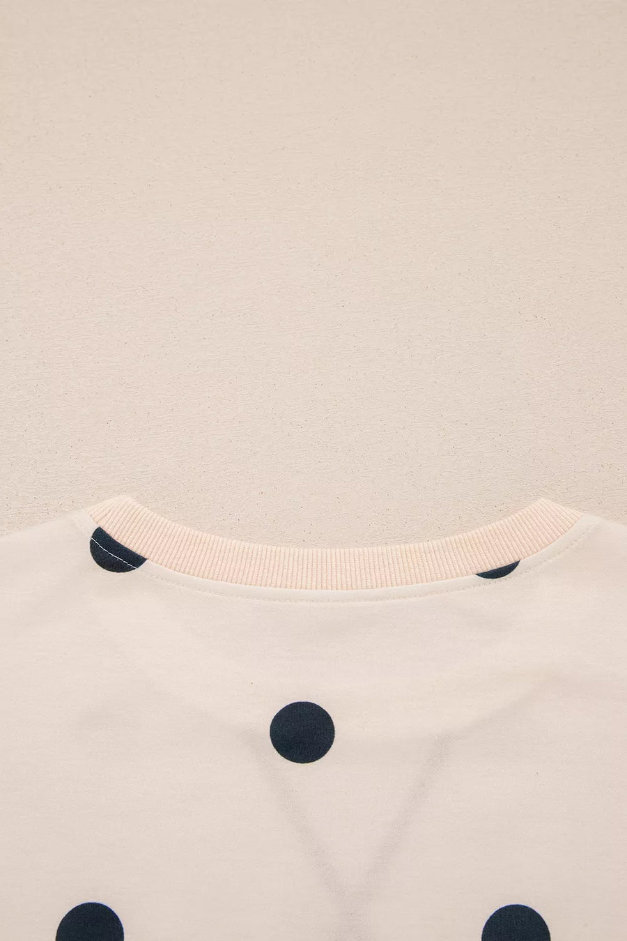 black tunic with pullover and polka dot