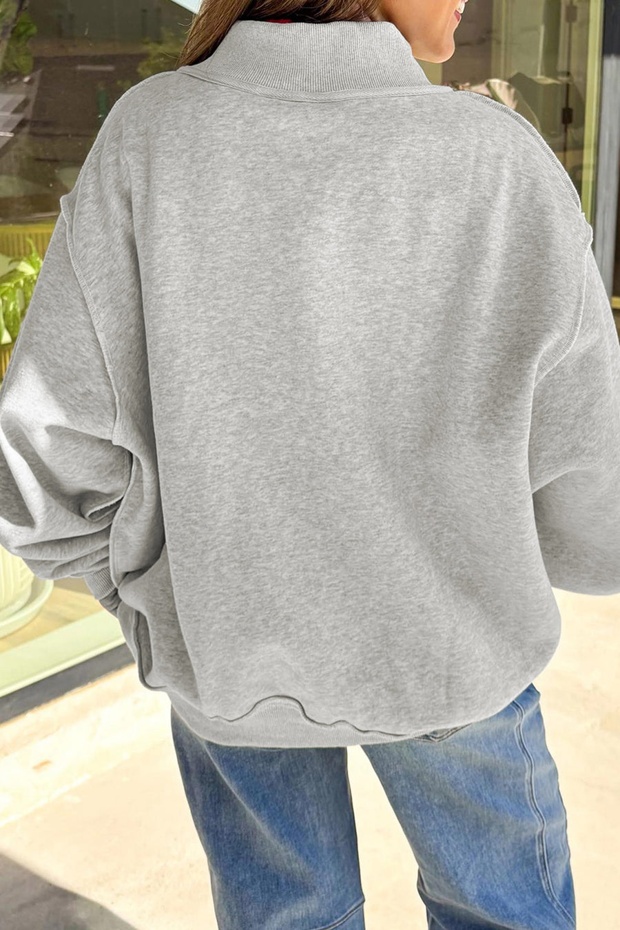 navy blue sweatshirt featuring oversized and graphic-print