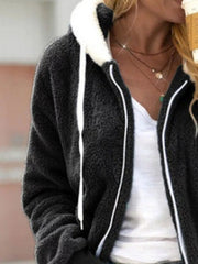 Cozy fleece zip-up hoodie in black with white trim and drawstring.
