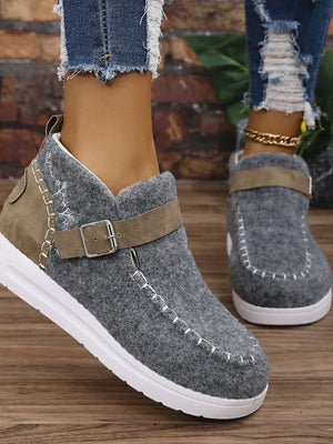 Gray textured stitch-detail buckle sneakers with contrast heel and white sole.