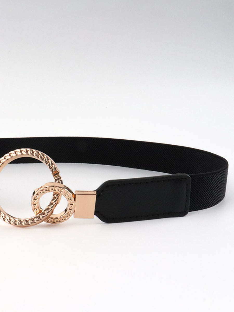 Black elastic belt with interlocked gold rings and buckle detail