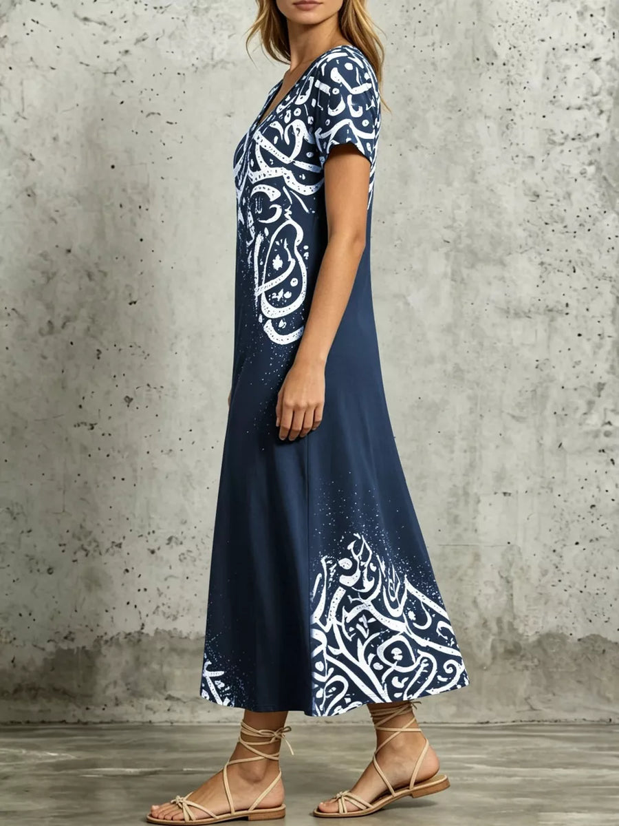 white midi dress featuring slit and abstract-script