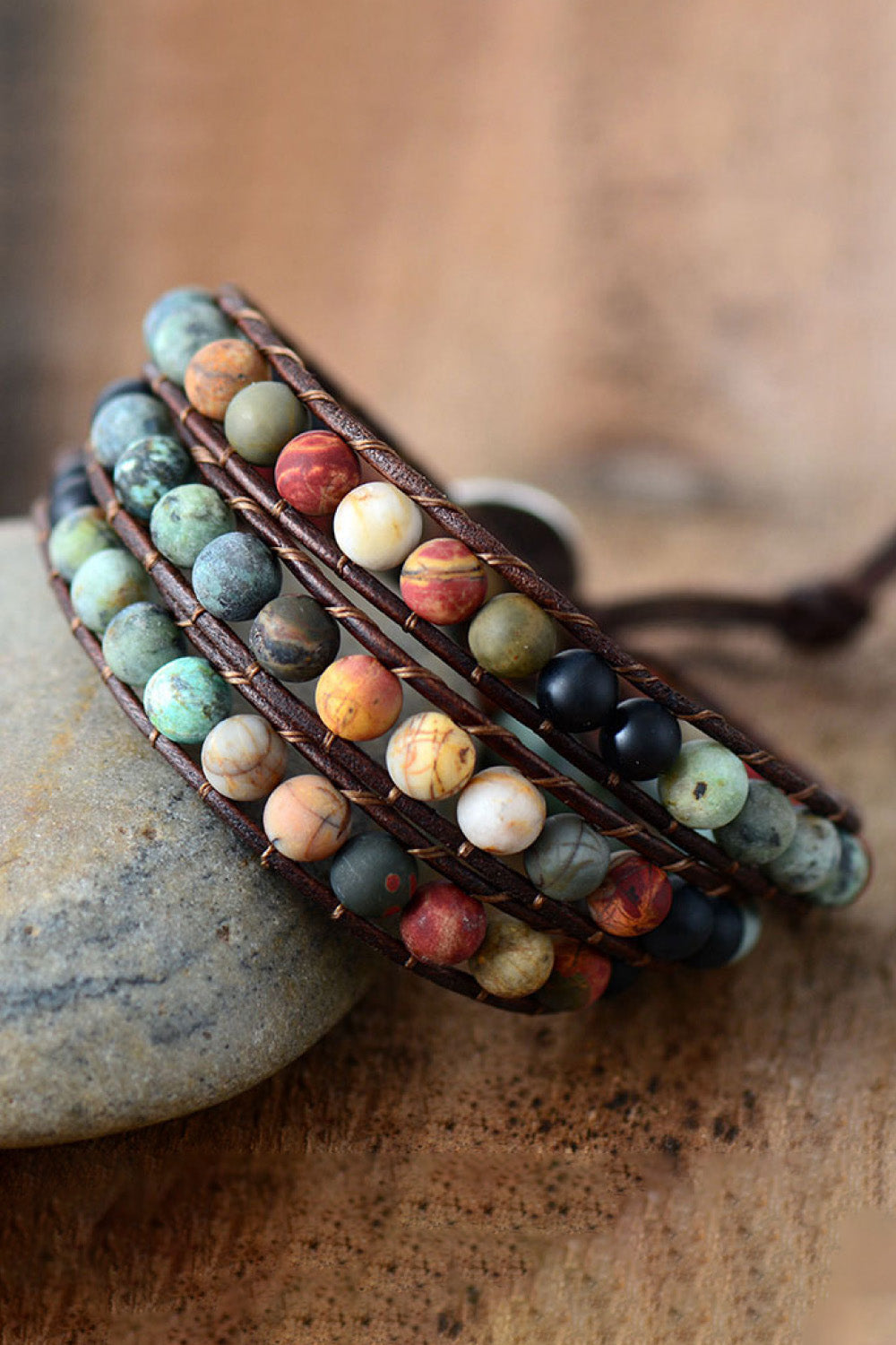 Wrap bracelet with multicolor stone beads and leather cord, boho style.