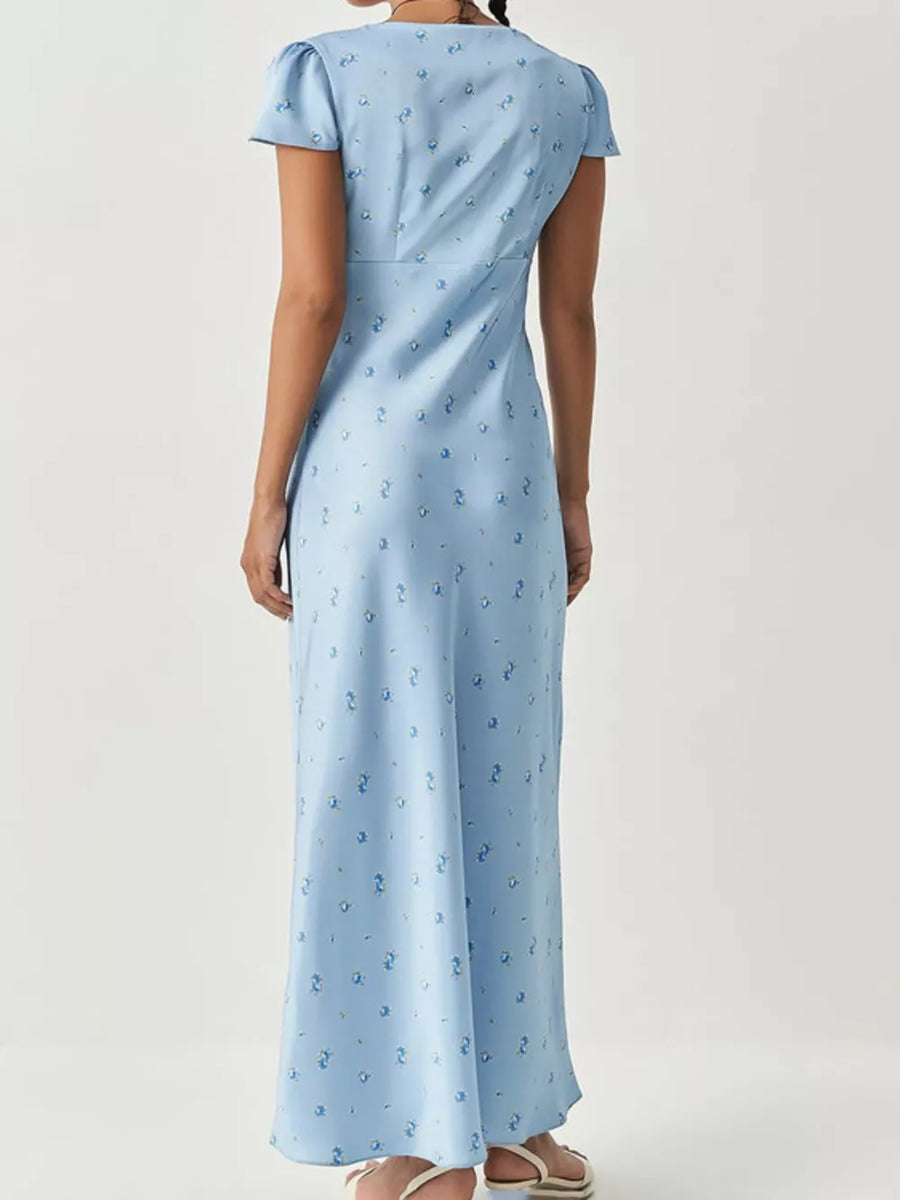 Light blue floral print maxi dress with short sleeves and a V-neckline.
