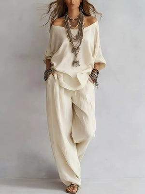 Pastel Yellow two-piece set with hip-length top, full-length pants and pullover
