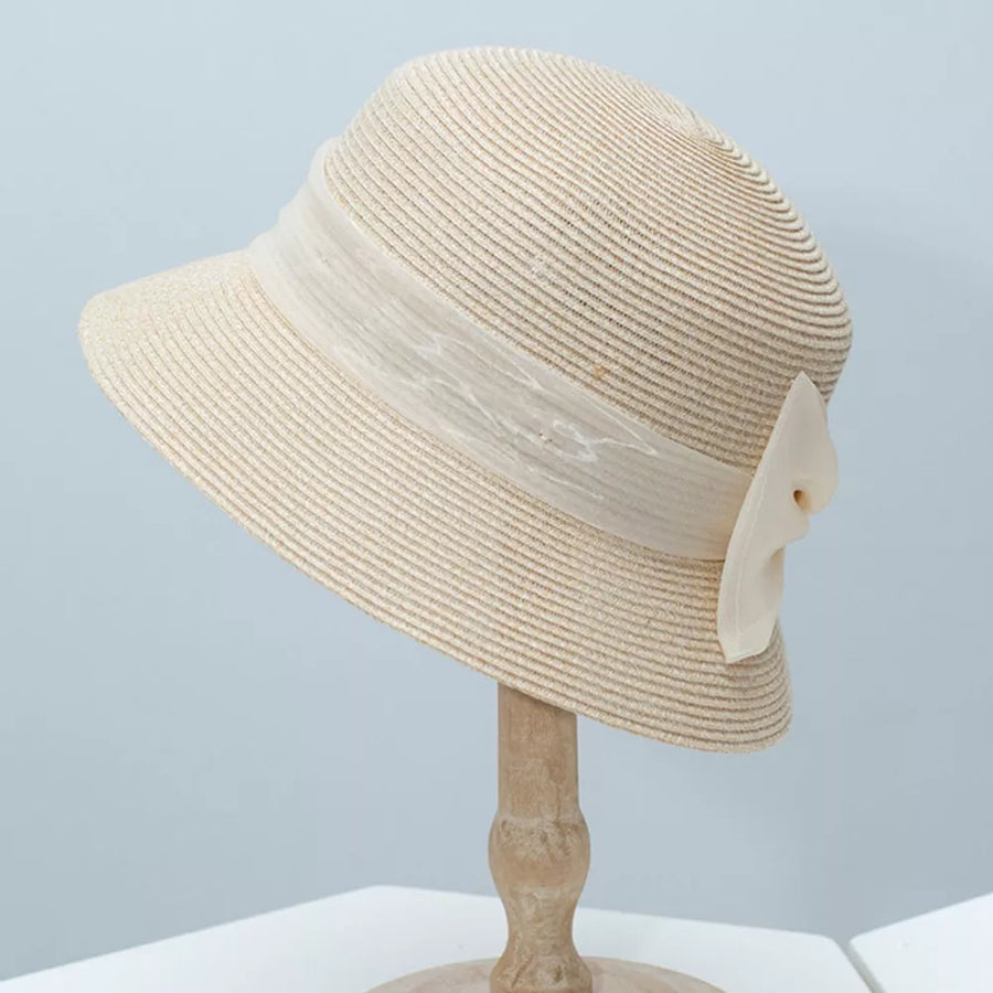Beige cloche sun hat with ribbon detail and bow