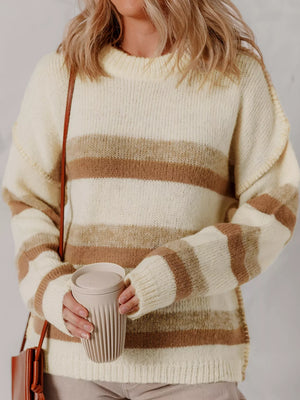 Drop shoulder striped sweater in cream and brown acrylic blend with a relaxed fit.