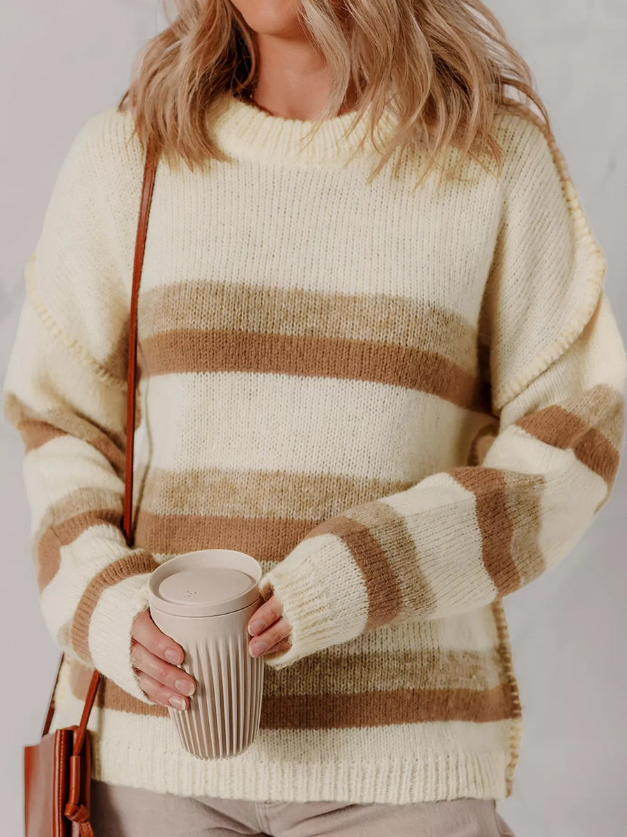 Drop shoulder striped sweater in cream and brown acrylic blend with a relaxed fit.