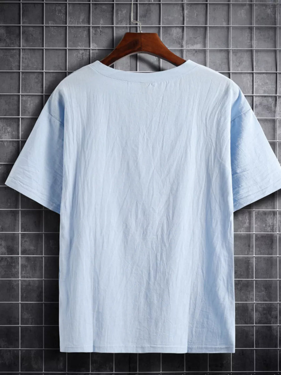 Light blue cotton crew neck t-shirt with short sleeves, shown from the back.