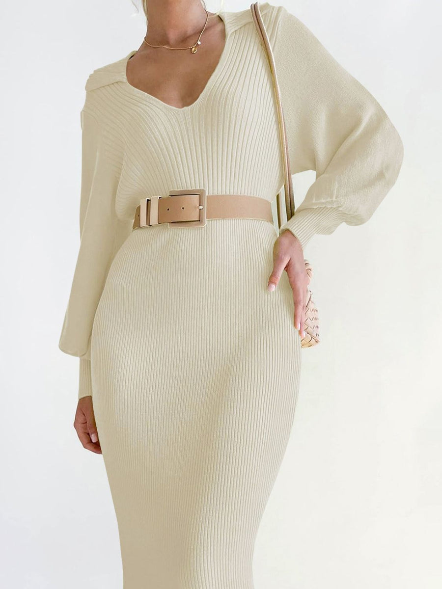 Cream ribbed knit midi dress with V-neck and long sleeves, cinched with a belt.