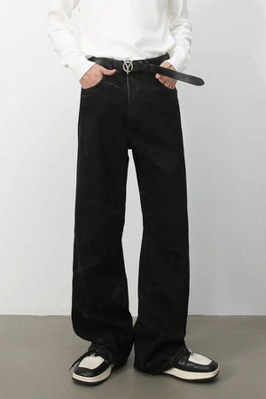 Faded black wide-leg denim jeans with a casual, baggy fit.
