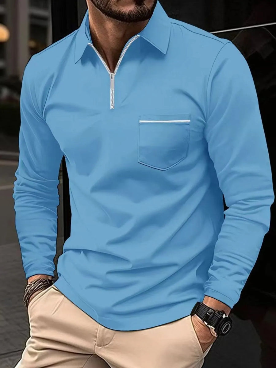 Long sleeve zip-front polo shirt in light blue with contrast pocket detail