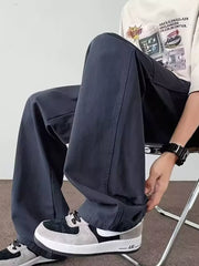 Navy blue casual wide-leg cargo pants with multiple pockets and a relaxed fit.