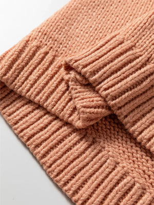 Sherbet knit cardigan with ribbed detail and a folded cuff.