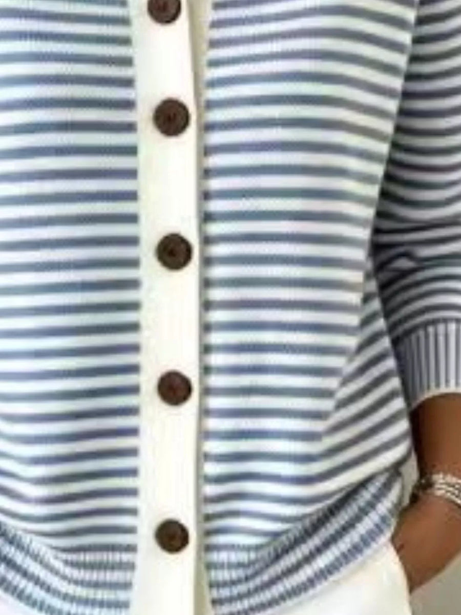 50% cotton, 50% polyester Care instructions: Machine wash cold cardigan in ivory with relaxed silhouette