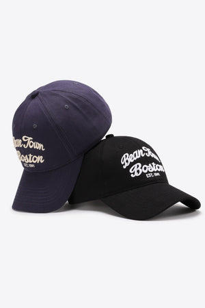 Dark blue and black baseball caps with white embroidered "Bean Town Boston EST. 1991" text.