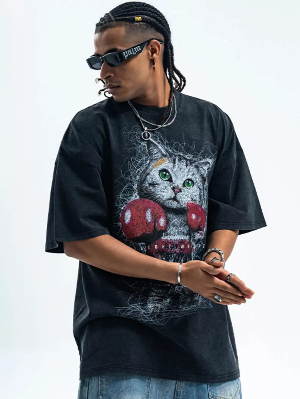 Black oversized cotton blend t-shirt with vintage cat graphic and boxing gloves.