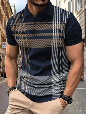 Navy geometric polo shirt with graphic panel and short sleeves.
