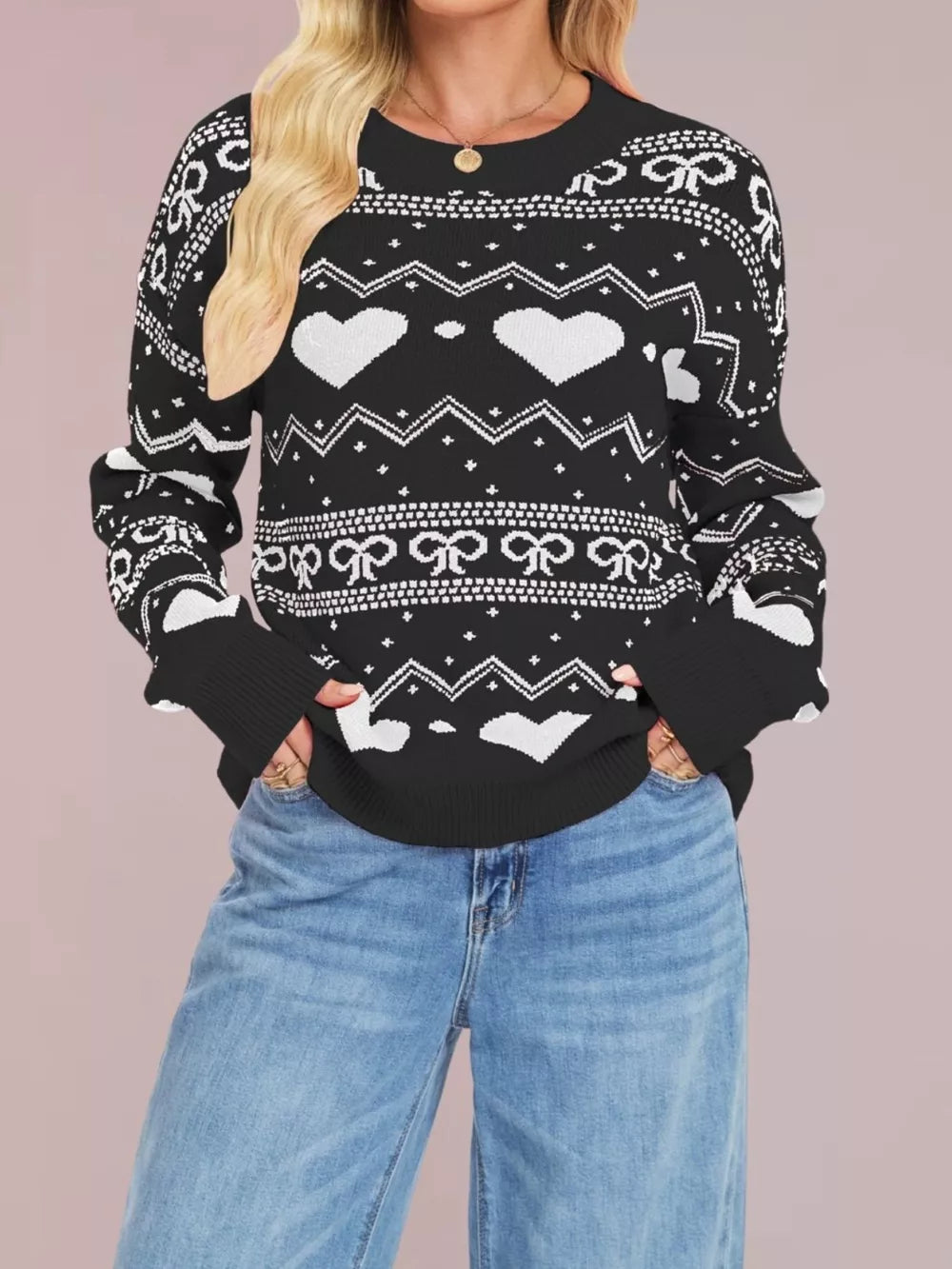 light pink pullover sweater with ribbed hem and long sleeve