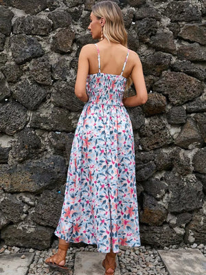 Maxi dress with floral print, smocked bodice, and spaghetti straps.
