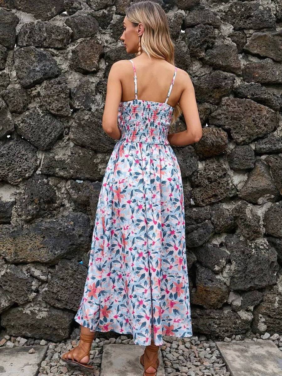 Maxi dress with floral print, smocked bodice, and spaghetti straps.