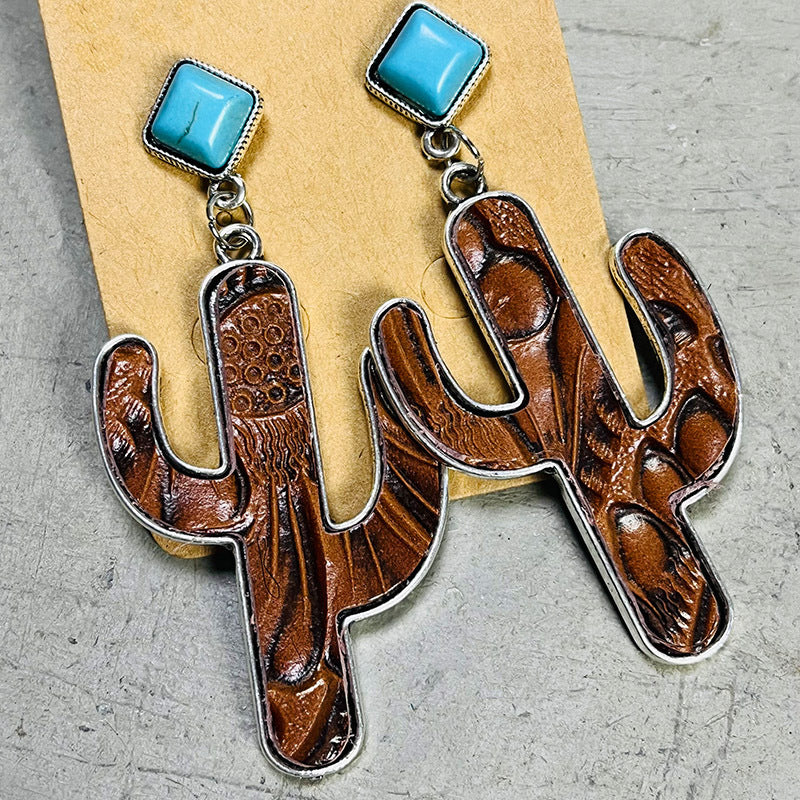 Brown cactus silhouette drop earrings with turquoise square tops