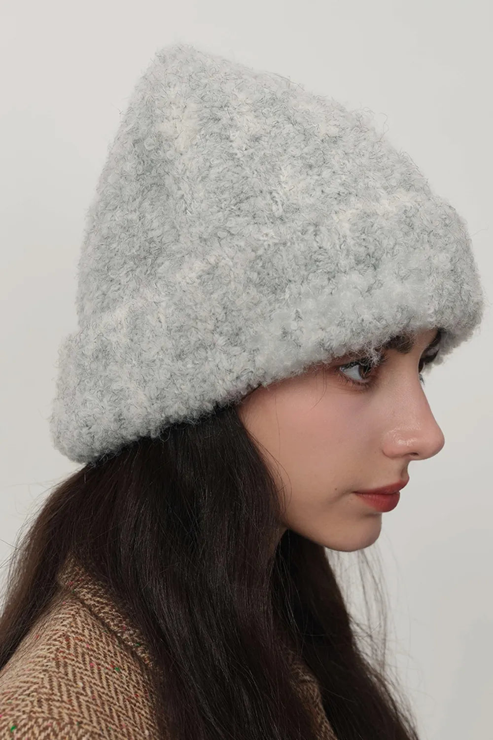 Gray textured bouclé knit beanie with a folded brim.