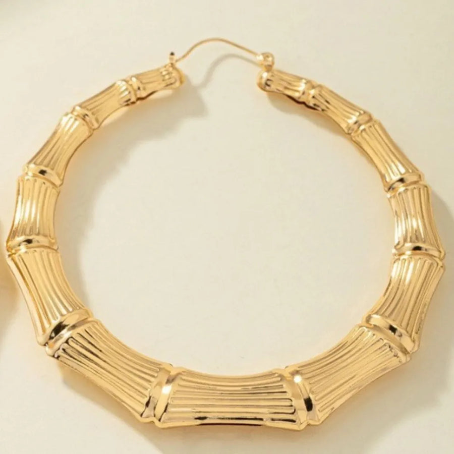 18K Gold-Plated,Stainless Steel Care instructions: Avoid wearing during exercise earrings in Black with hoop silhouette