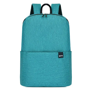 Textured aqua school backpack with minimalist design and front pocket.